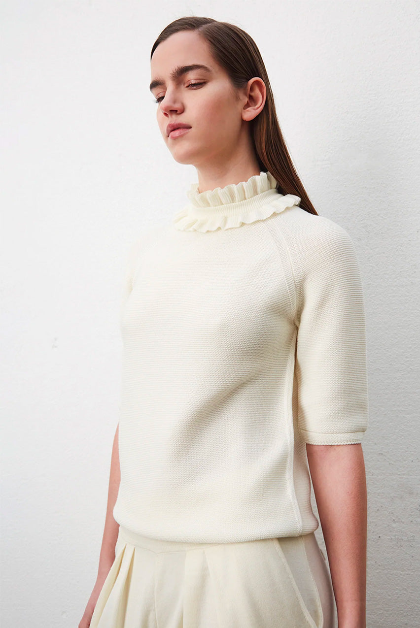 RUFFLED HIGH NECK KNIT TOP